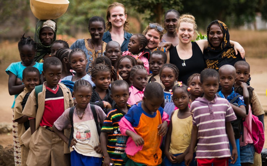 Becky Morrison (Globetops) & Brian Brady (Peace Corps) rolling with the homies in Kindia, Guinea.