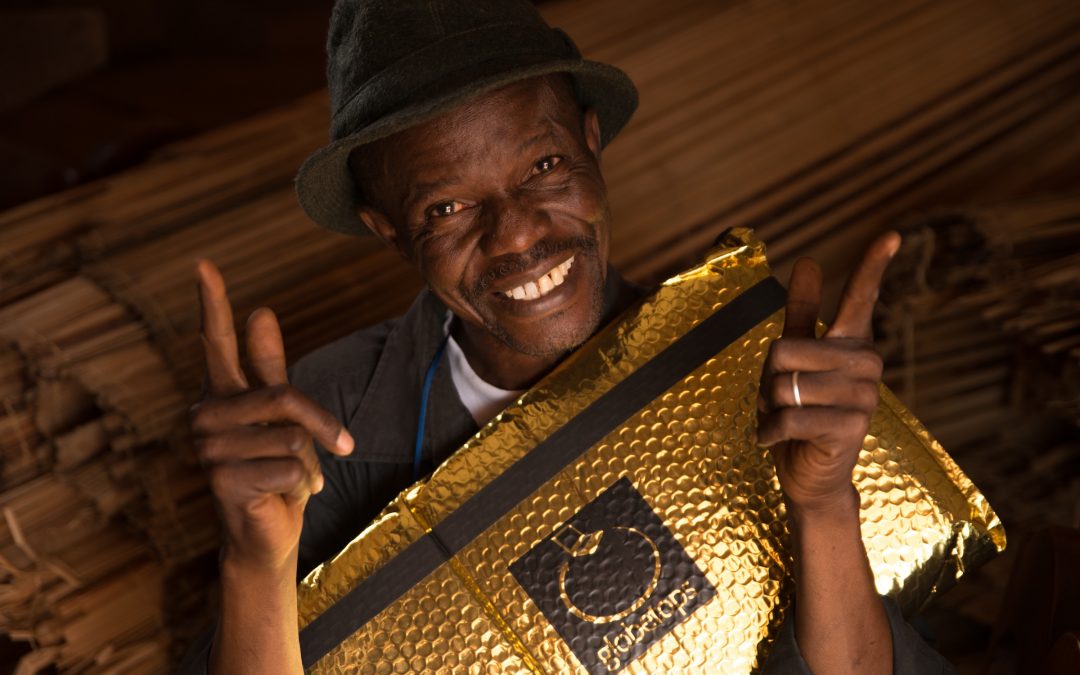 Mamady Papa Touré just after getting a laptop for his Artisans Association.