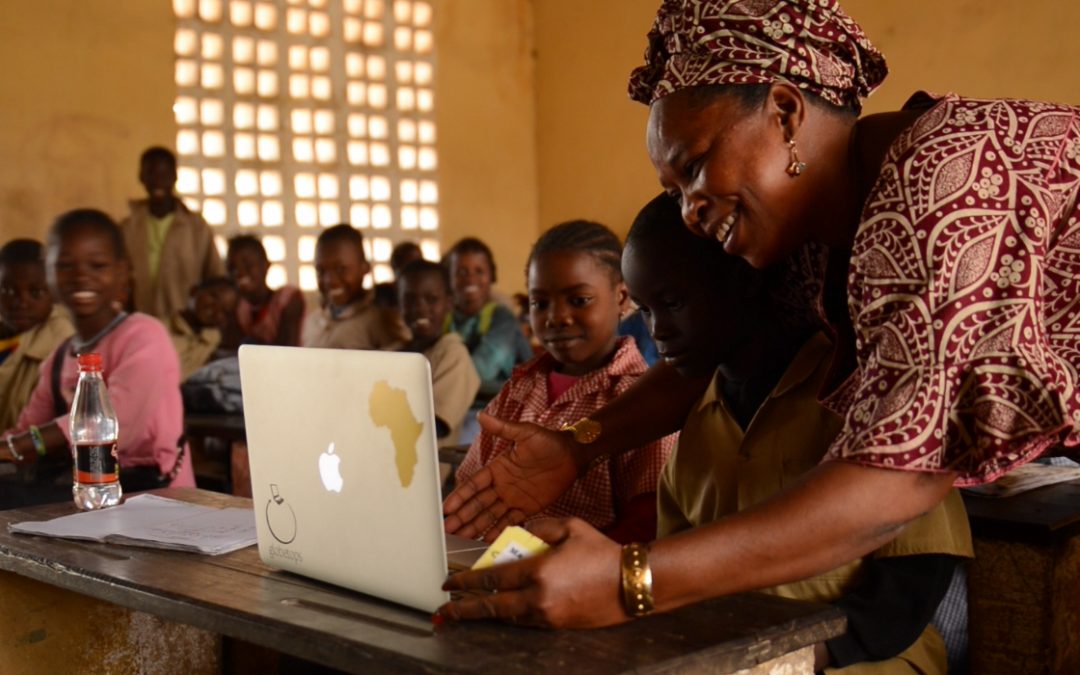 Mariama Bangoura with her students in Ferefou, Guinea.