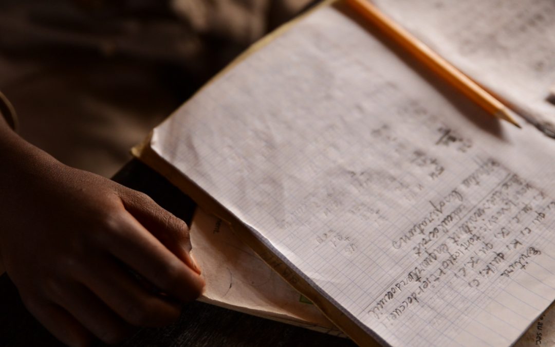A student’s notebook in Ferefou, Guinea.